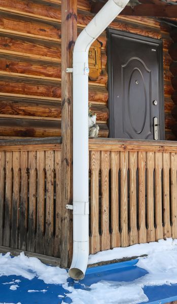 Porch Downspout Installation in Carthage